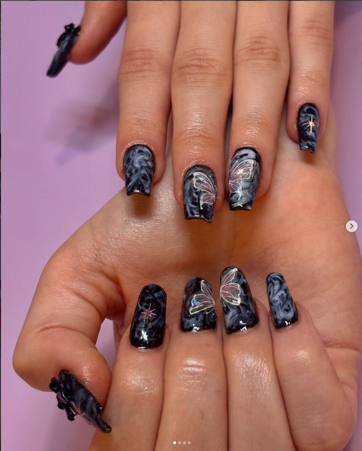Smoky black nails with iridescent butterflies